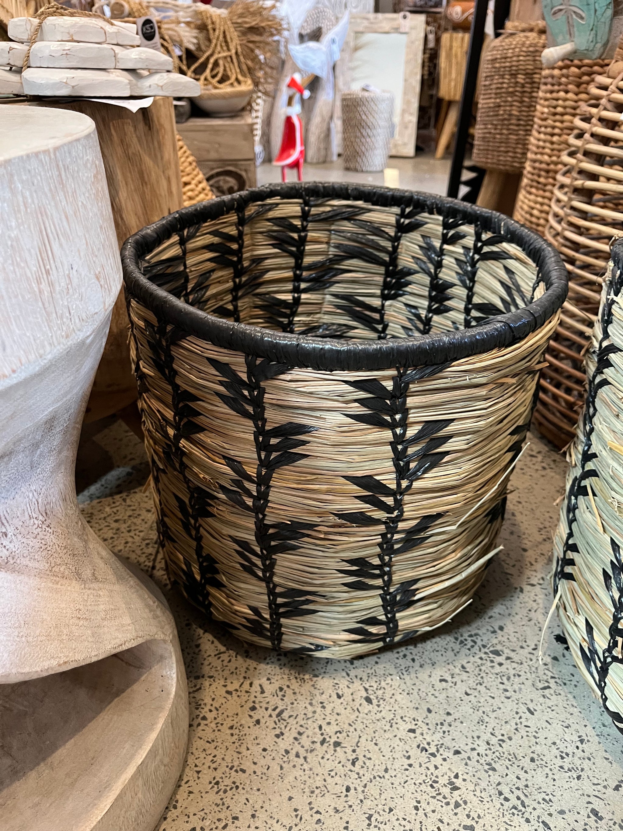 Set 3 woven baskets with natural/ black detail.