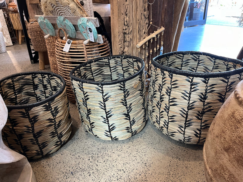 Set 3 woven baskets with natural/ black detail.