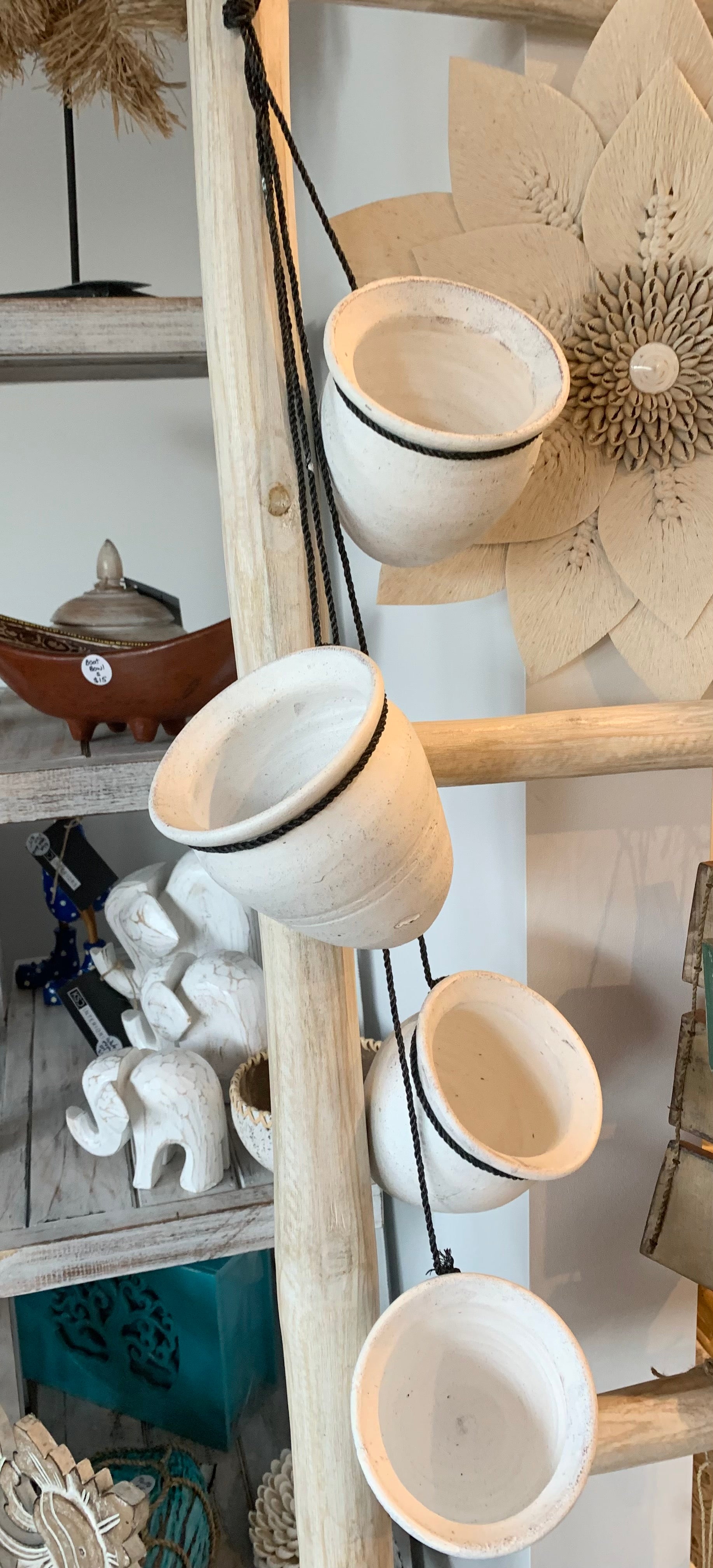 4 white terracotta pot hangings. Usually $40
