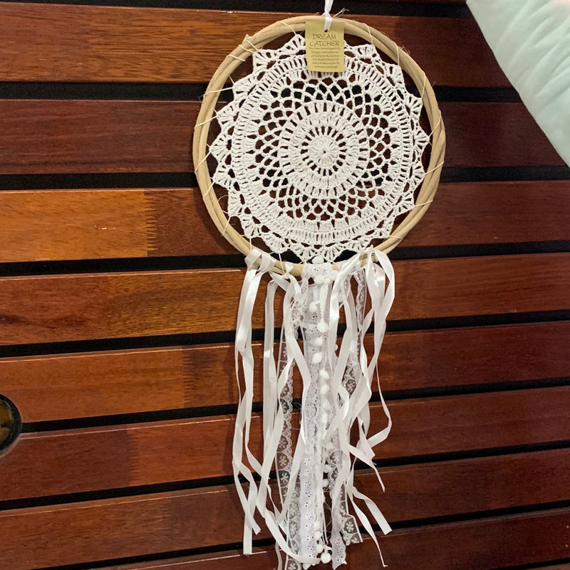 White Dream Catcher with string and pom pom. Usually $25