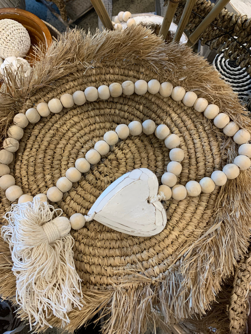 Natural beads and timber heart decoration.