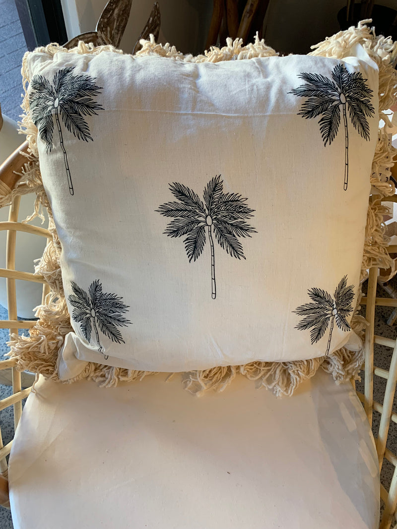 Natural cushion with frill and palm tree design