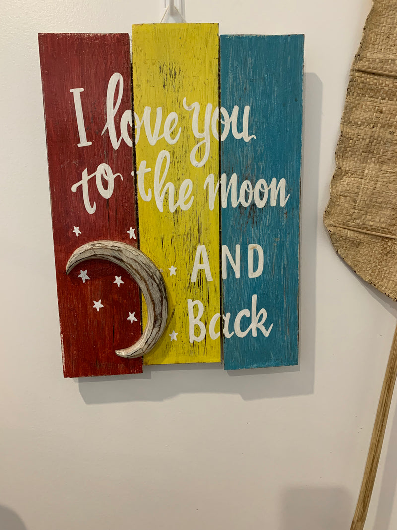 I love you to the moon and back timber sign.