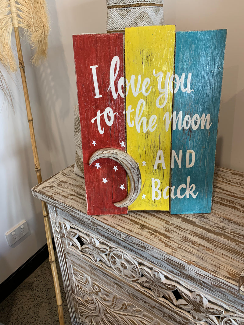 I love you to the moon and back timber sign.